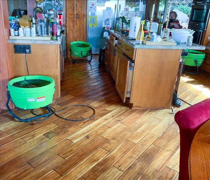 Air movers in kitchen.